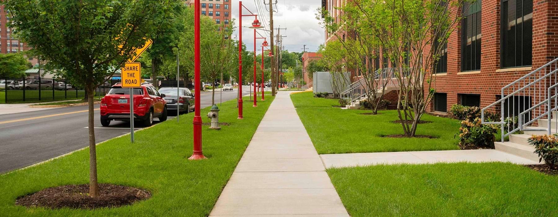 spacious walkways with green turf and clean neighborhood streets